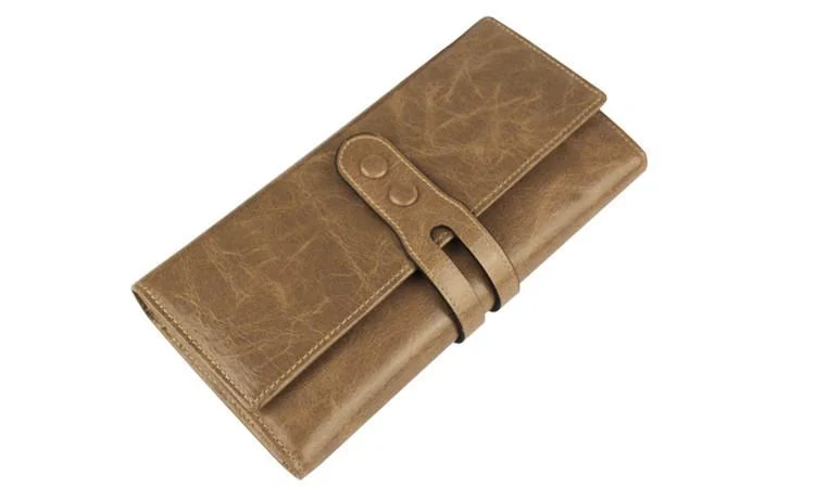 Brown wallet with a flap that wraps around the body