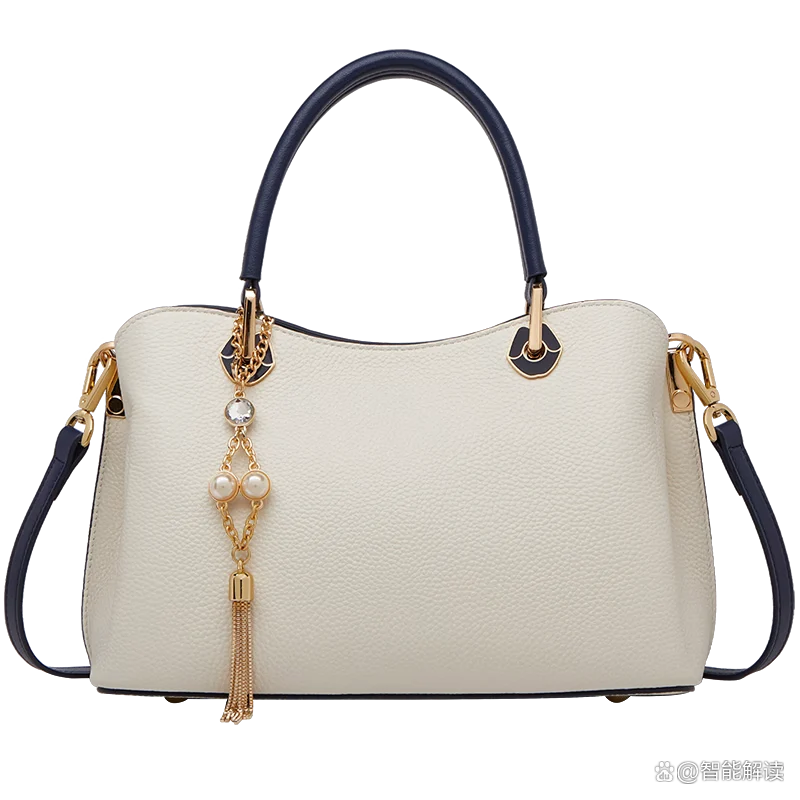 Cream bag with navy handle and strap trim, gold tassel charm and pearls