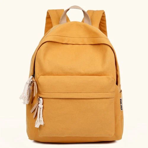 Mustard front-pocket school backpack photographed on a plain background